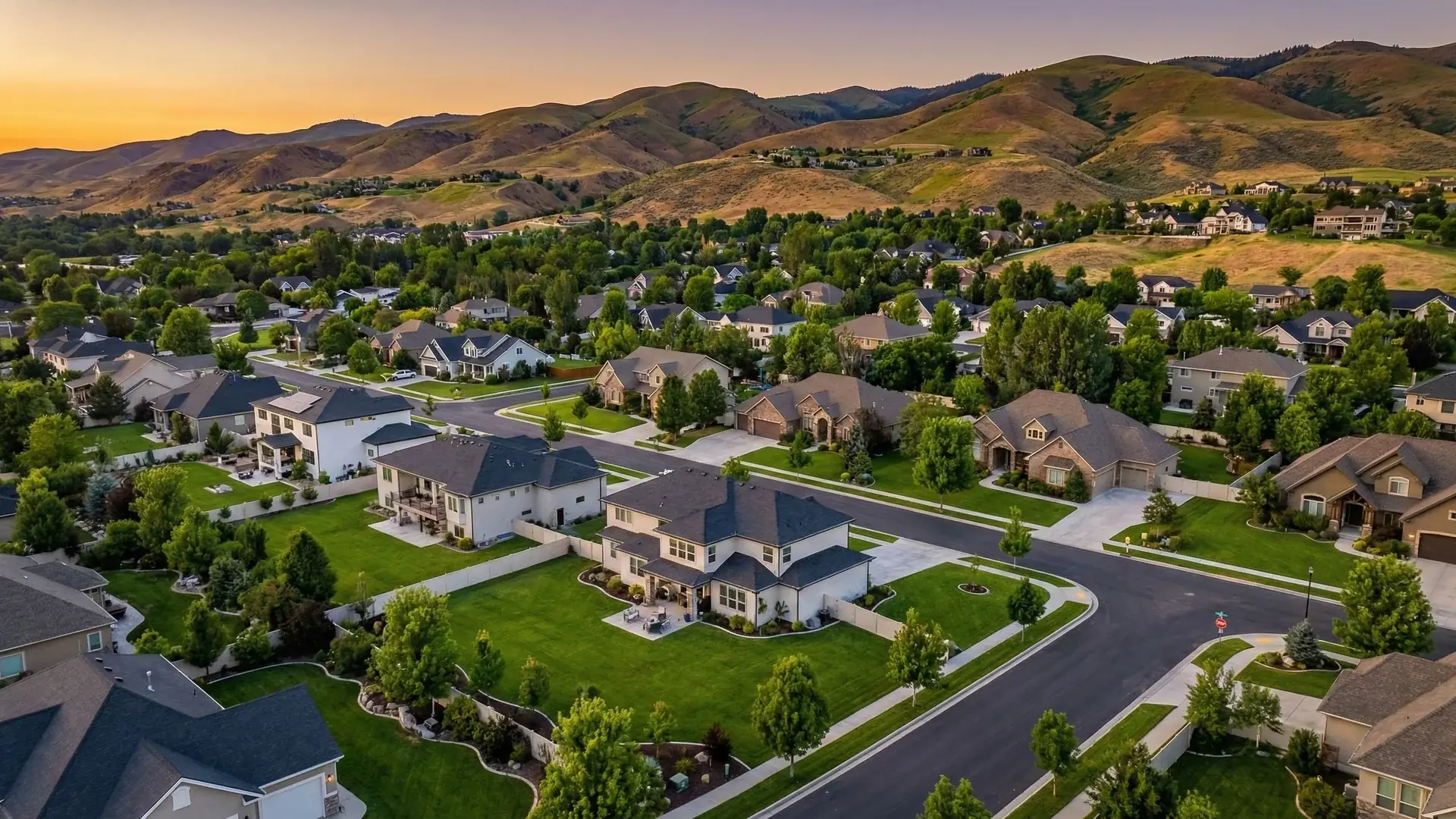Boise and the Treasure Valley at dusk, with the foothills behind